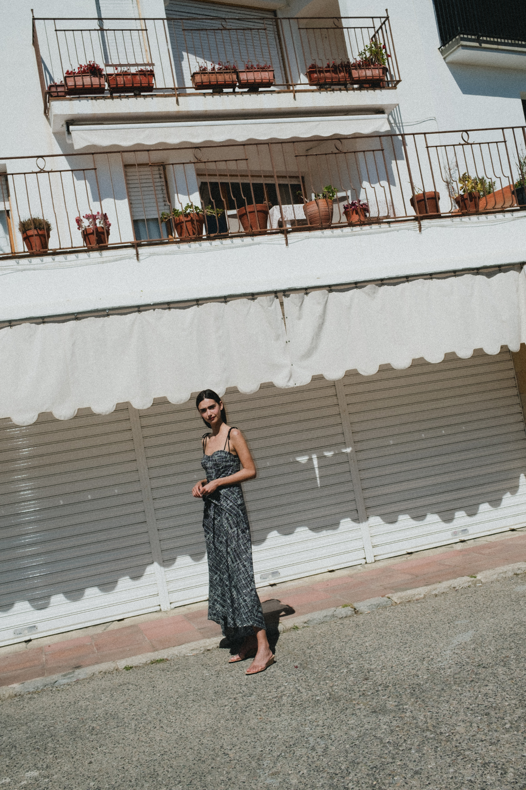 LEYA - ASYMMETRIC CUT FRONT TIED LONG DRESS - CROSSED LINES BLACK